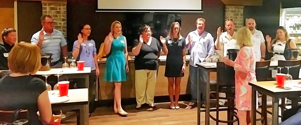 Cathy Bell leading the sheep to the slaughter. Left to Right: Eric Needle, Tim McKercher, Stephanie Herndon, Madison Conradis, Emma Richard, Akaila Amara, Keith Ried, Ron Buford, Jeremy Gerster, Keri Goff